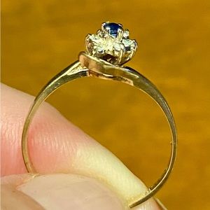 Dainty blue sapphire and diamond ring.